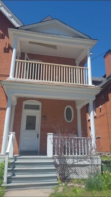 New custom-built railing installed on a second-floor balcony in Ottawa - Ottawa Handiman