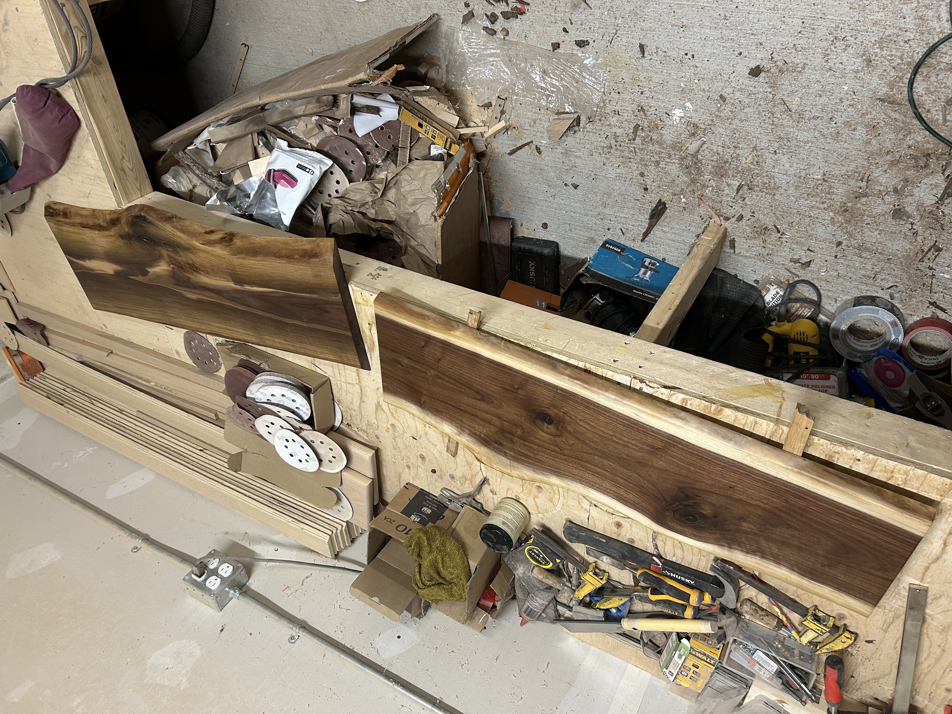 Custom charcuterie boards in workshop with handles being installed - Ottawa Handiman