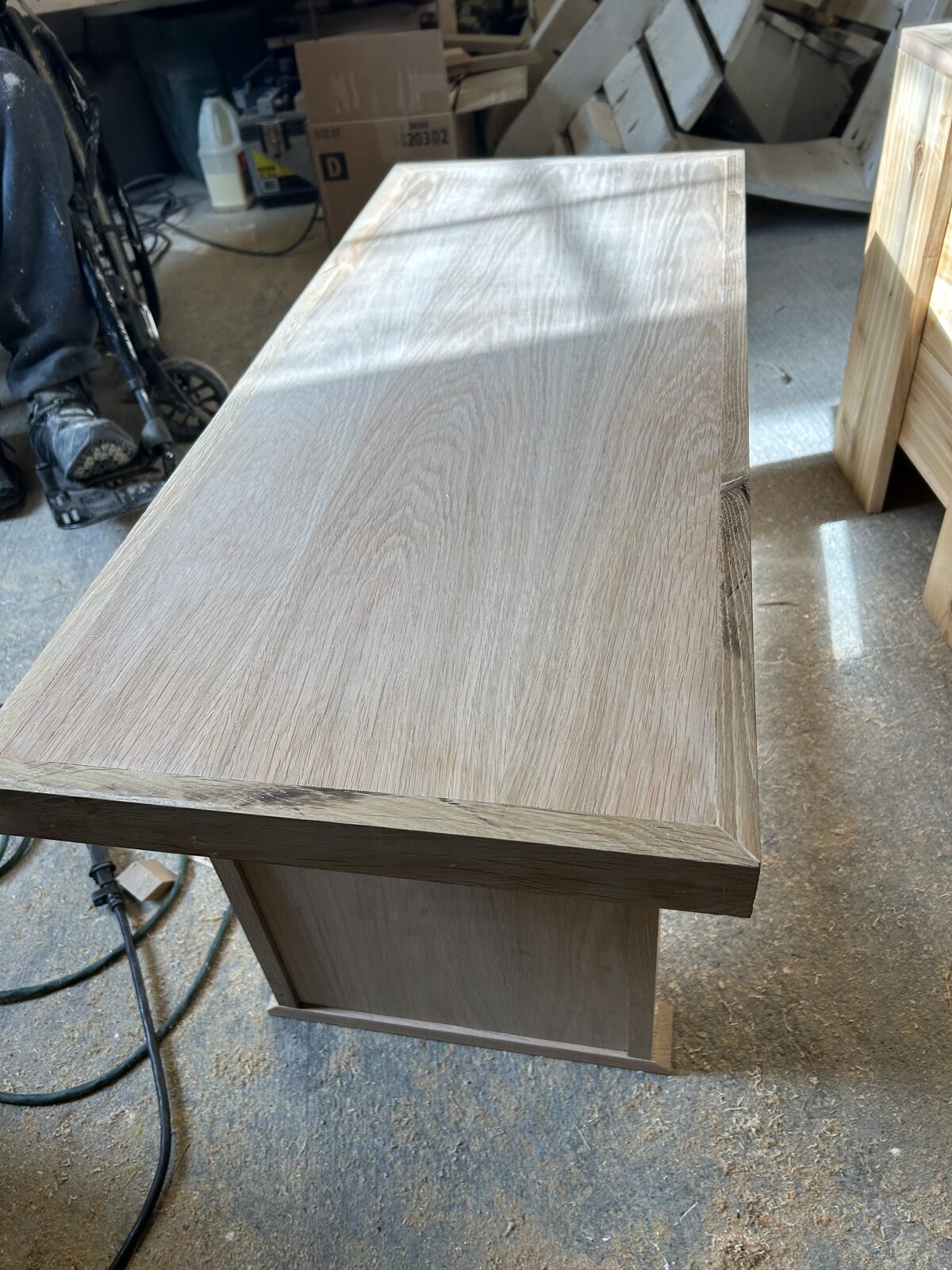 Custom-built wooden furniture bench in workshop before sanding - Ottawa Handiman