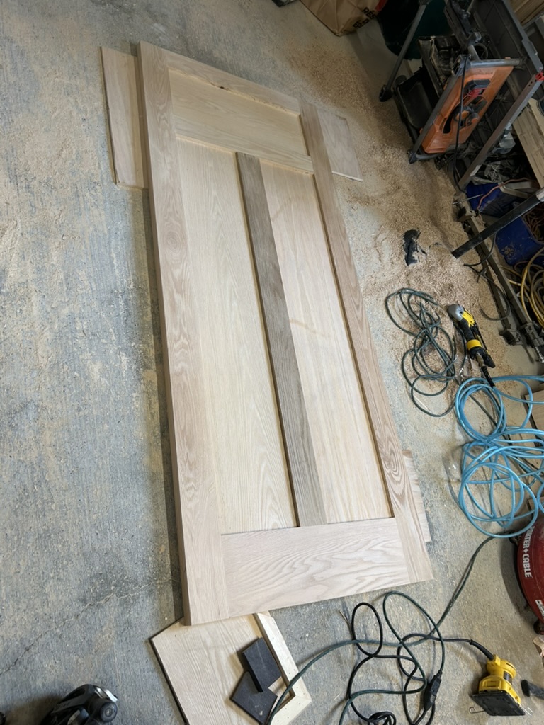Custom oak door replica under construction in Barrhaven Ottawa woodworking workshop - Ottawa Handiman heritage door builder